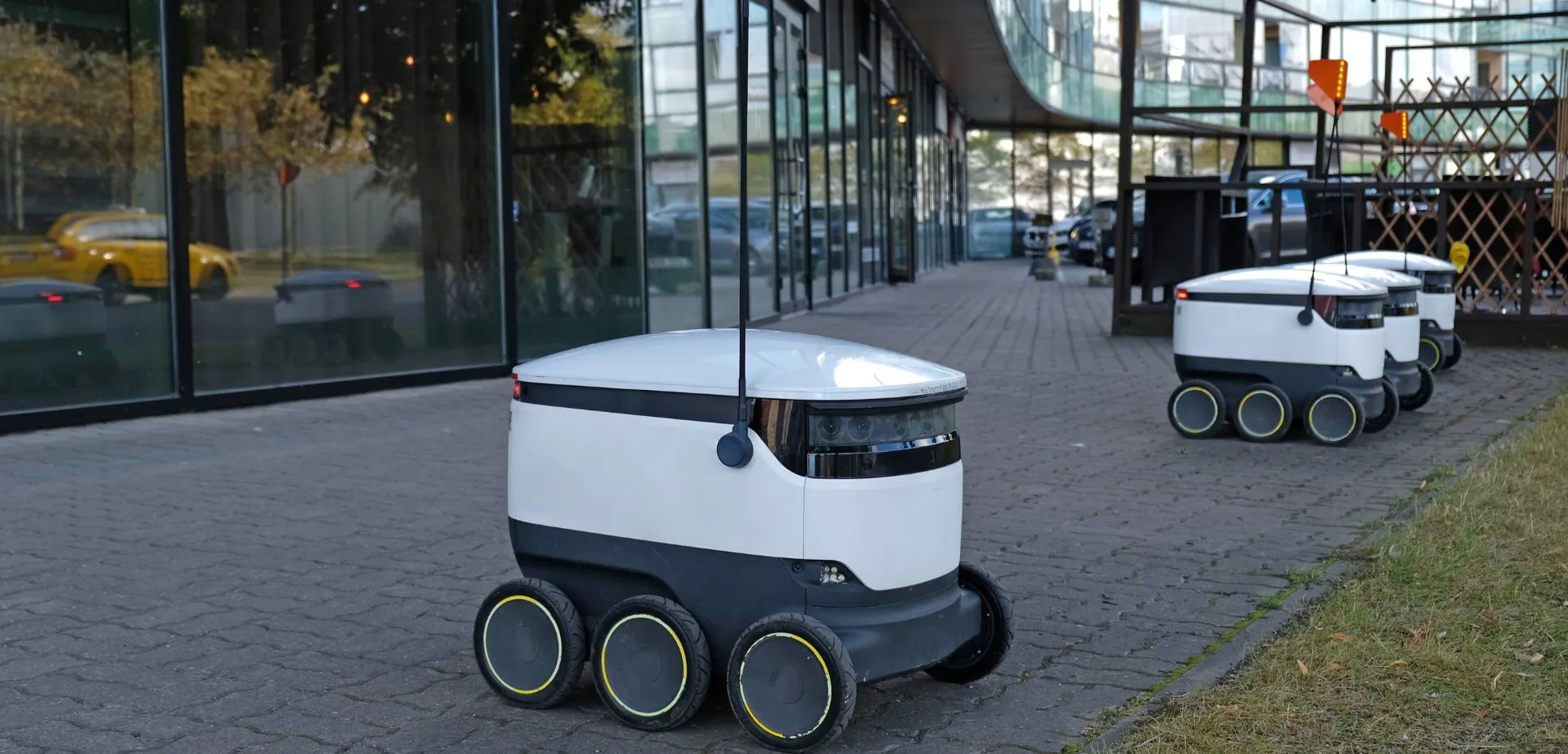 Autonomous delivery robot on street.
